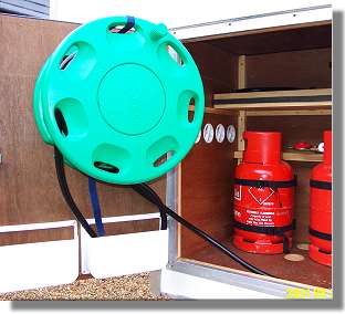 A modified garden hose reel used to fill Mog's 450 litre fresh water tank.