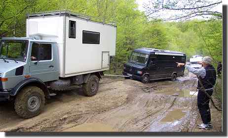 Mog towing K-Nine thru the mud.