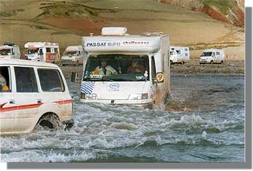 Crossing a river on the Club's 2000 trip to China