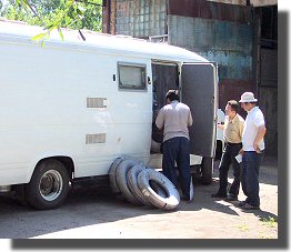 Peter collect his eight new tyres from the wharehouse.
